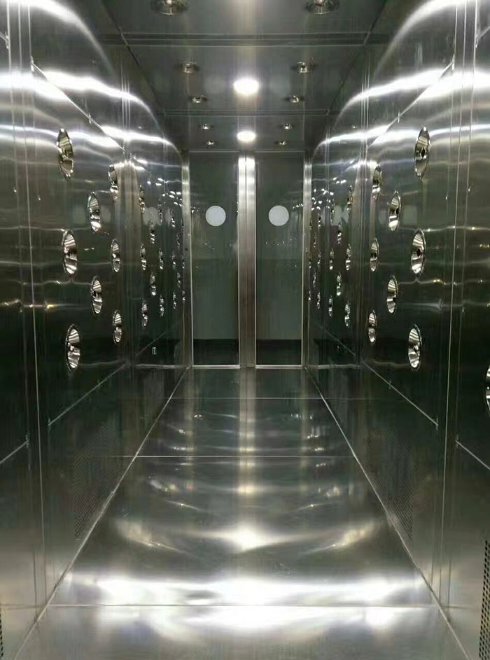 檢查風淋室風機是否正常工作，是否有異物堵塞。